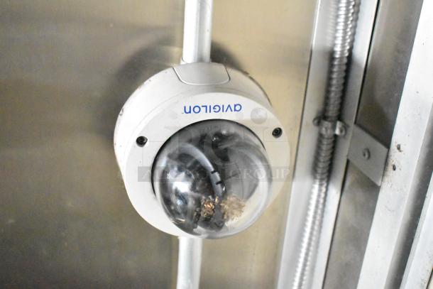 Security camera mounted inside Diamond Cargo mobile kitchen trailer.
