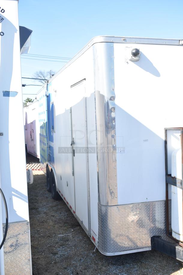 2021 Diamond Cargo 8.5' x 24' cold food and beverage trailer, white exterior, good condition. VIN 53NBE2429M1089847.