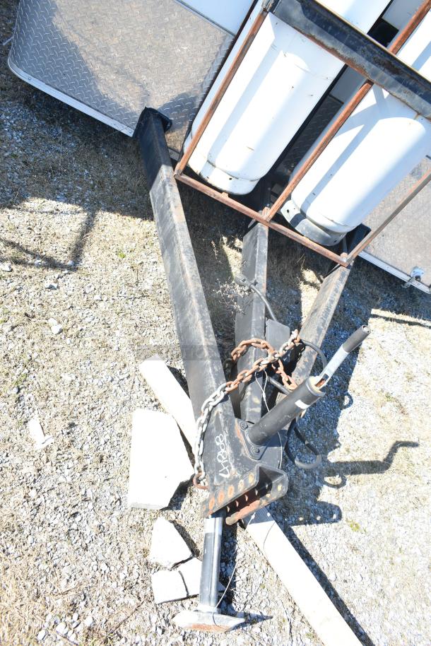 2021 Diamond Cargo 8.5' x 24' trailer hitch with dual propane tanks. VIN 53NBE2429M1089847. Rugged, used condition.