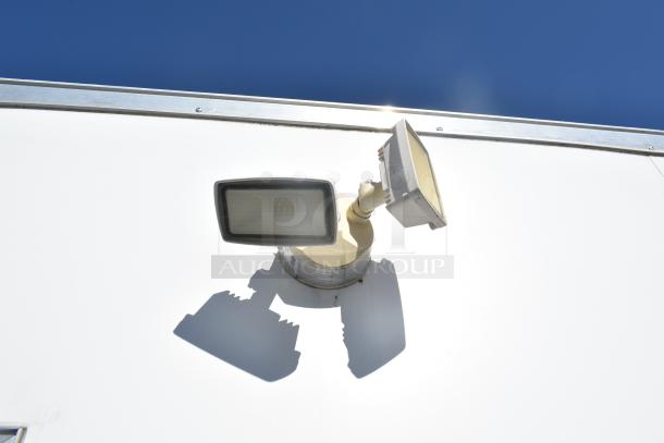 2021 Diamond Cargo 8.5' x 24' trailer light fixture detail, white finish, part of fulfillment trailer.