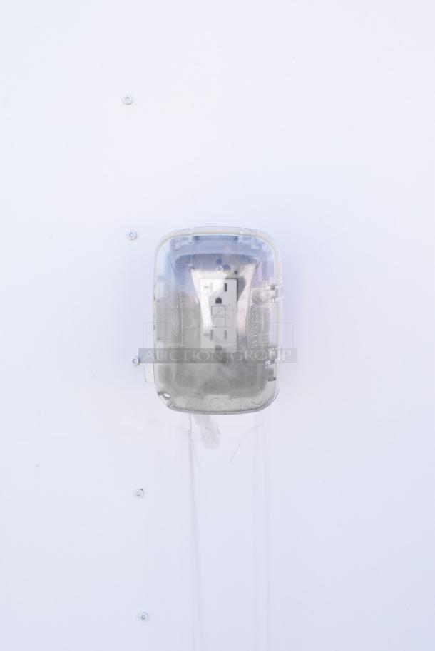 2021 Diamond Cargo food trailer with a visible external electrical outlet cover, white panel background.