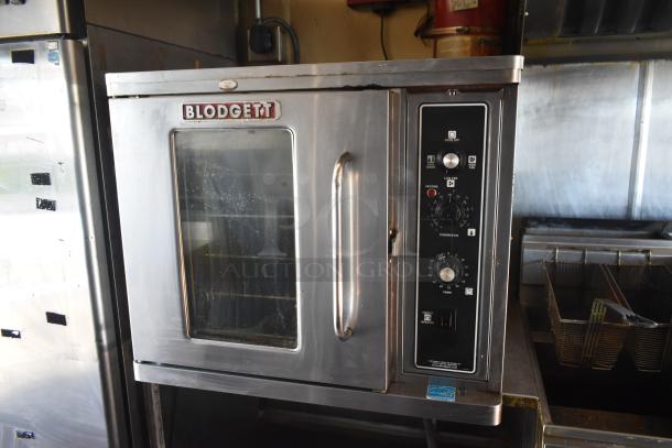 Blodgett oven in a 2012 Quality Cargo food trailer, dual fryer, pizza prep setup. VIN 50ZZ1E427KN012840.