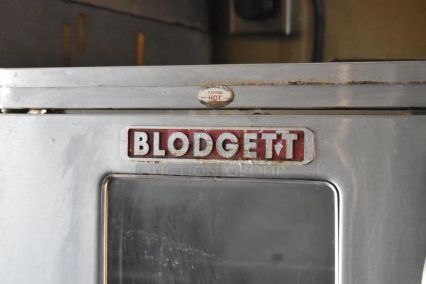 Blodgett oven in 2012 Quality Cargo food trailer, stainless steel, with caution label. Part of dual fryer and pizza prep setup.