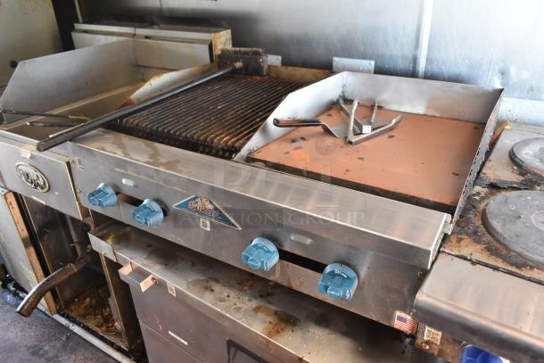 2012 Quality Cargo food trailer with dual fryer, pizza prep, and Castle series griddle. Good used condition.