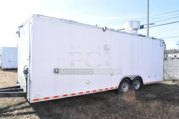 2021 Diamond Cargo 8.5' x 24' food trailer, equipped with a grease hood and air conditioning. VIN 53NBE2424M1089724.