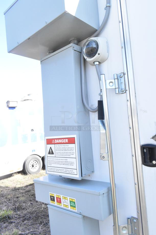 2021 Diamond Cargo 8.5' x 24' food trailer, featuring electrical panel, grease hood, air conditioning, and safety warnings.
