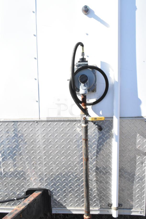 2021 Diamond Cargo 8.5' x 24' food trailer exterior close-up showing utility connections.