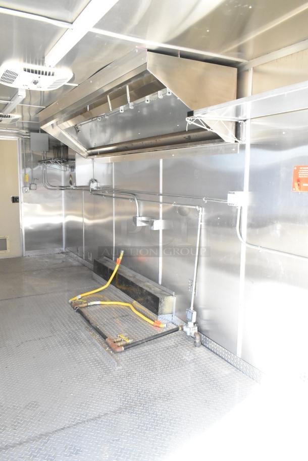 2021 Diamond Cargo 8.5' x 24' food trailer interior with grease hood and air conditioning; VIN 53NBE2424M1089724.