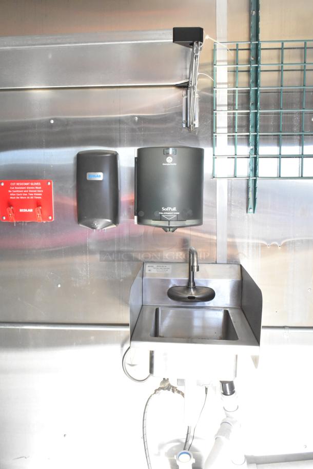 2021 Diamond Cargo 8.5' x 24' food trailer interior with stainless steel sink, grease hood, and air conditioning.