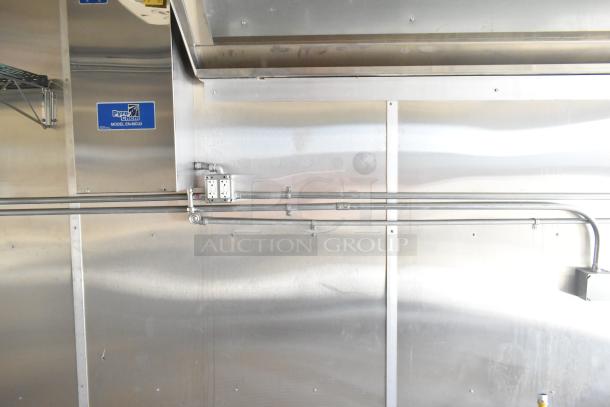 2021 Diamond Cargo 8.5' x 24' food trailer interior with grease hood, air conditioning, electric outlets, and Pyro-Chem label.