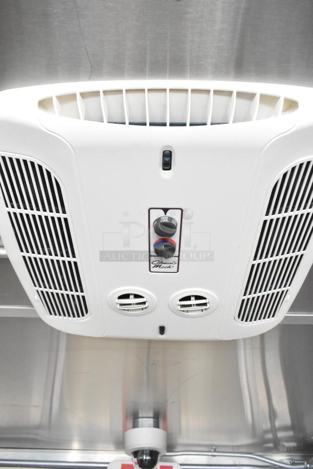 2021 Diamond Cargo food trailer with air conditioning and grease hood, featuring Coleman-Mach controls. VIN 53NBE2424M1089724.