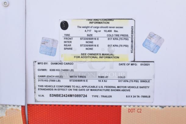 2021 Diamond Cargo 8.5' x 24' food trailer label with GVWR 6350 kg, VIN 53NBE2424M1089724, includes grease hood and AC.