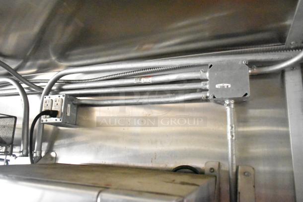 2020 Diamond Cargo mobile kitchen trailer interior wiring, metal conduit, electrical outlets.