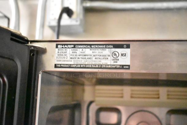 Sharp commercial microwave oven label, model R-21LVF, manufactured in May 2020, 120VAC, UL and NSF listed.