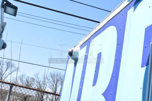 2020 Diamond Cargo 8.5' x 24' mobile kitchen trailer with security camera, exterior signage, and utility installations.