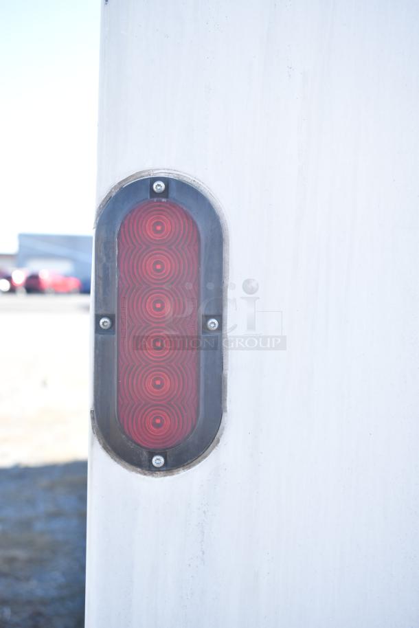 2021 Diamond Cargo trailer brake light detail; cold food & beverage fulfillment unit in good condition.