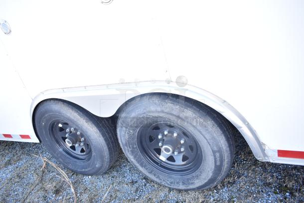 2021 Diamond Cargo 8.5' x 24' trailer, dual axles, steel wheels, used condition, for cold food and beverage storage.