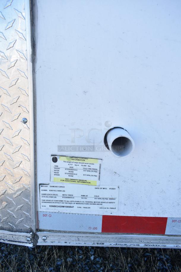 2021 Diamond Cargo 8.5' x 24' cold food trailer, VIN 53NBE2429M1089847. Tire and loading info visible.
