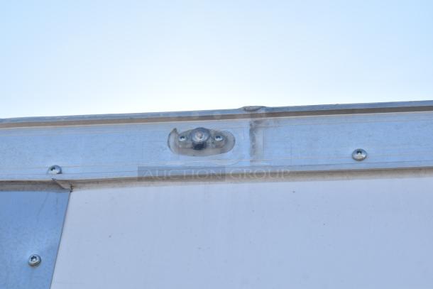 2021 Diamond Cargo 8.5' x 24' trailer, VIN 53NBE2429M1089847. Metallic finish, visible screws, trim detail shown.