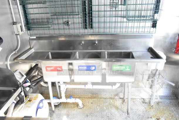 2021 Diamond Cargo food trailer interior featuring a three-compartment sink for washing, rinsing, and sanitizing.