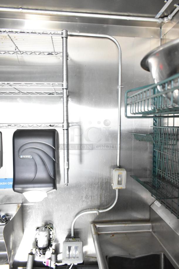2021 Diamond Cargo 8.5' x 24' trailer interior, stainless steel surfaces, shelves, and handwash station, VIN 53NBE2429M1089847.