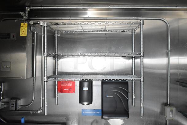 2021 Diamond Cargo 8.5' x 24' cold food trailer interior showing stainless shelves, Ansul system, and sanitation equipment.