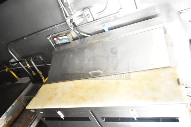 2021 Diamond Cargo 8.5' x 24' Cold Food & Beverage Fulfillment Trailer, interior view, stainless steel counter, utility piping.