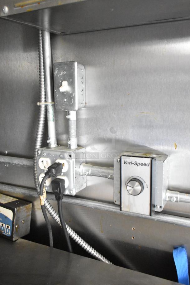 2021 Diamond Cargo 8.5' x 24' trailer interior showing electrical panel with plugs, switches, and Vari-Speed control.