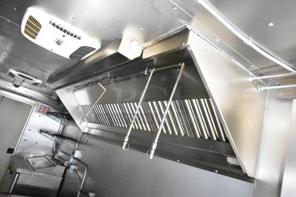 2021 Diamond Cargo 8.5' x 24' trailer interior, featuring stainless steel ventilation hood and stainless sink.