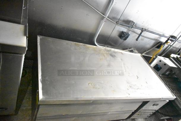 2021 Diamond Cargo 8.5' x 24' trailer interior, showing a stainless steel work surface. VIN 53NBE2429M1089847.