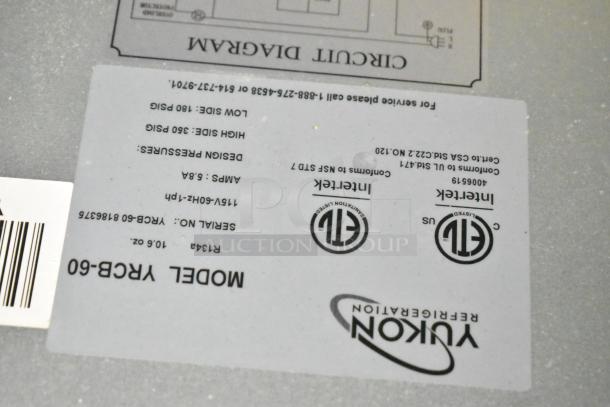 Label on a Yukon refrigeration unit in a 2021 Diamond Cargo 8.5' x 24' cold food and beverage trailer. Model: YRCB-60.