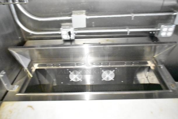 2021 Diamond Cargo cold food trailer interior, featuring stainless steel finish and ventilation fans. Excellent condition.