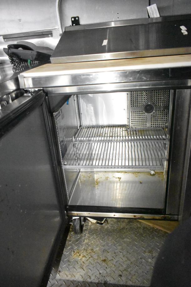 2021 Diamond Cargo 8.5' x 24' trailer interior showing stainless steel shelving and cooling system. Used condition.