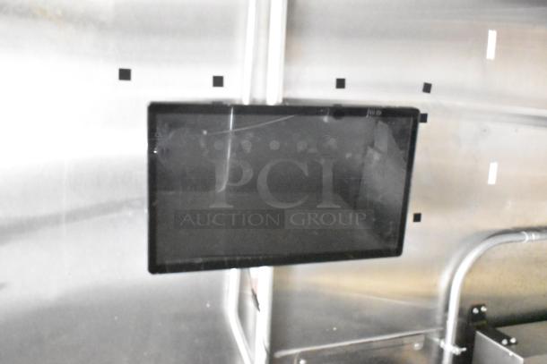 2021 Diamond Cargo 8.5' x 24' trailer interior, featuring stainless steel walls and mounted equipment.