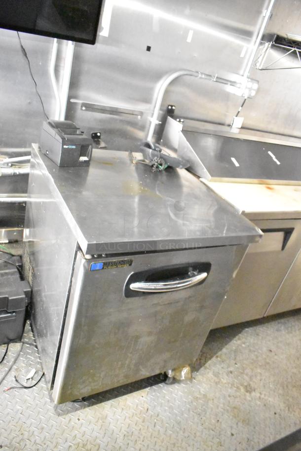 2021 Diamond Cargo 8.5' x 24' Cold Food & Beverage Fulfillment Trailer interior, featuring kitchen equipment and storage.