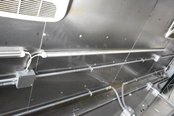 Interior view of a 2021 Diamond Cargo 8.5' x 24' trailer. Visible wiring and ventilation indicate cold storage design.