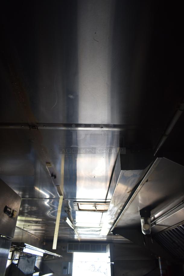 2019 Quality Cargo 24ft food trailer interior, featuring restoration potential. Ceiling view with visible fixtures and ventilation.