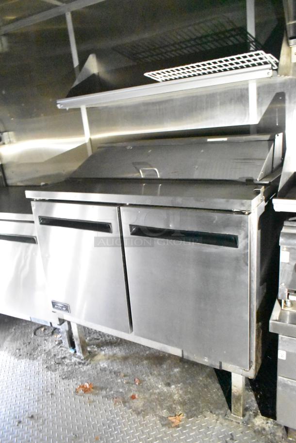 2020 Diamond Cargo 24' kitchen trailer equipped with grease hood, Pitco fryer, Wells dual griddle, Arctic Air fridge.