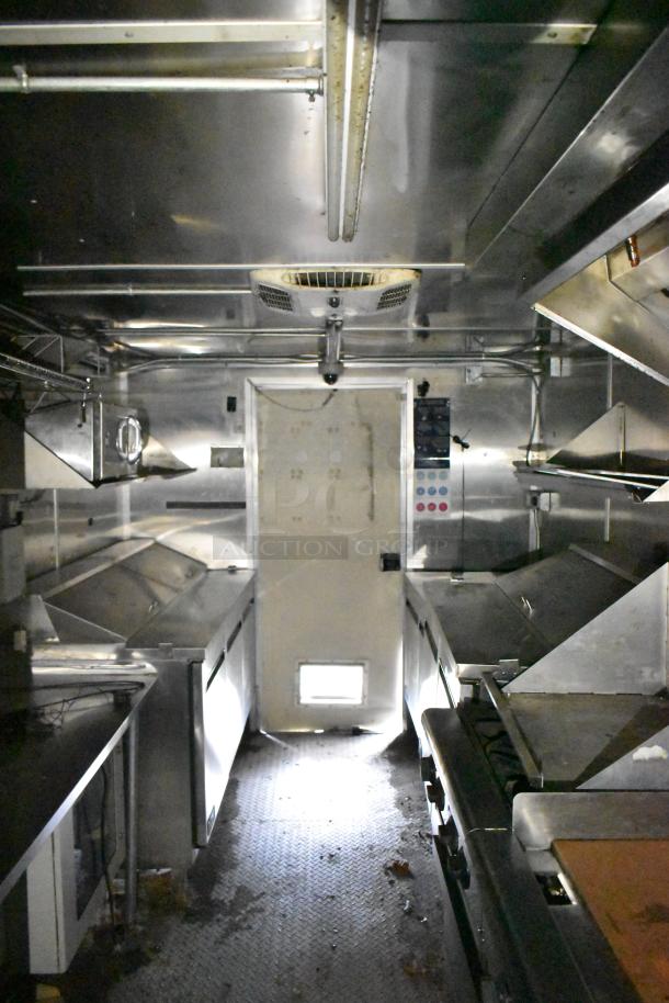 2020 Diamond Cargo 24' Kitchen Trailer, features grease hood, Pitco fryer, Wells griddle, Arctic Air refrigeration suite.