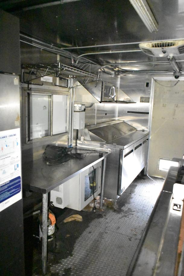 2020 Diamond Cargo 24' kitchen trailer, includes grease hood, Pitco fryer, Wells griddle, Arctic Air refrigeration.