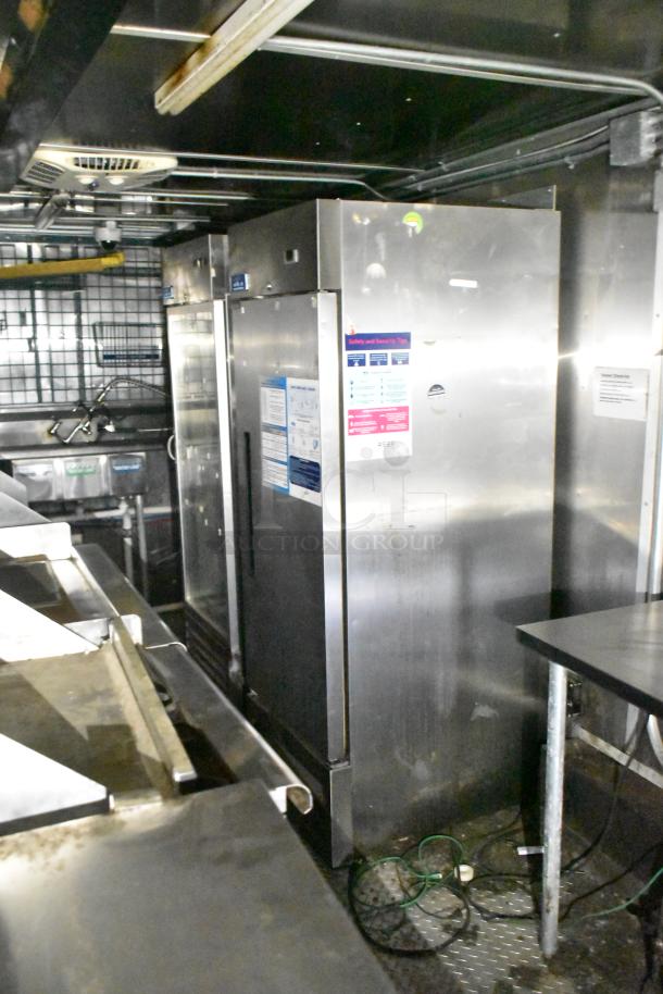 2020 Diamond Cargo 24' commercial kitchen trailer; includes grease hood, Pitco fryer, Wells griddle, Arctic Air fridge suite.