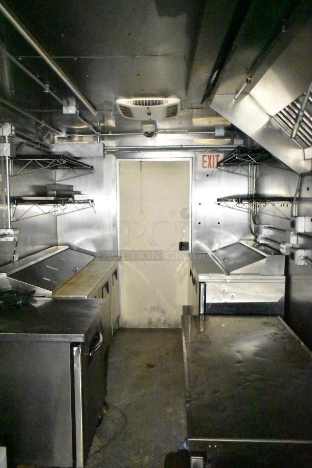2021 Diamond Cargo 8.5x24 mobile kitchen trailer with Econ-Air hood, TurboChef ovens, and extensive refrigeration setup.