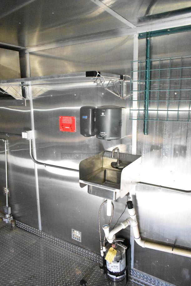 2021 Diamond Cargo 24ft x 8.5ft kitchen trailer interior with stainless steel sink, Ansul fire suppression, and Paragon hood.