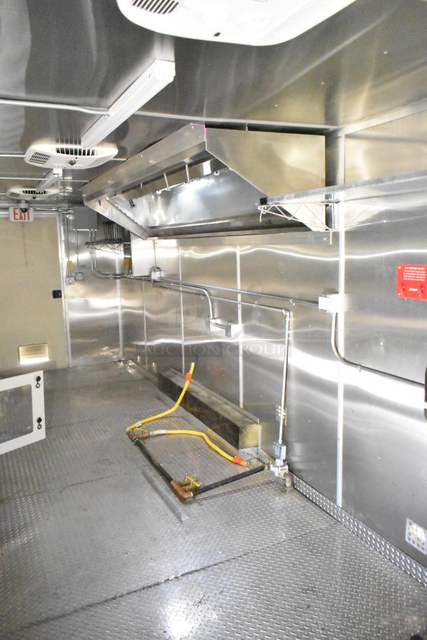 2021 Diamond Cargo 24ft x 8.5ft commercial kitchen trailer, like new, with Paragon hood and Ansul fire suppression.