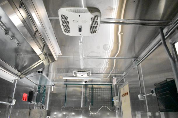 LIKE NEW 2021 Diamond Cargo 24ft x 8.5ft kitchen trailer interior with Paragon hood, Ansul fire suppression system.