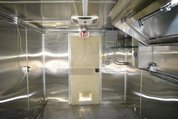 2021 Diamond Cargo 24ft x 8.5ft commercial kitchen trailer interior, featuring Paragon hood and Ansul fire suppression system. Like new.