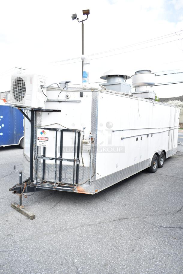 2019 Quality Cargo 24' food trailer with grease hood, fire suppression, fryer, grill, and Blodgett oven. VIN 50ZZ1E427KN012840.