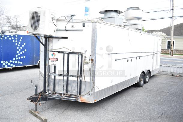 2019 Quality Cargo 24' food trailer with fire suppression, fryer, grill, pizza prep, and Blodgett oven. VIN 50ZZ1E427KN012840.