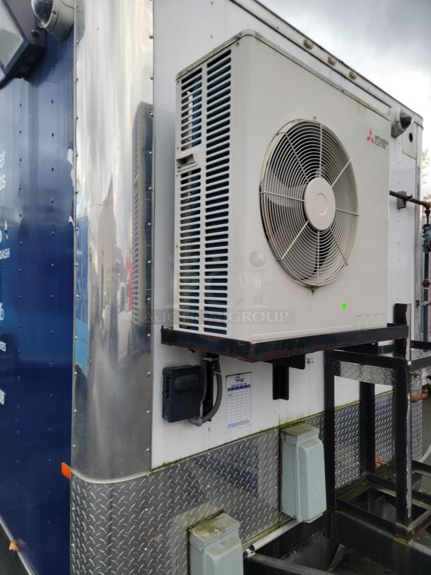 Mobile kitchen trailer with Mitsubishi Electric Mini-Split HVAC visible, part of a fully-equipped 2020 Rock Solid cargo chassis.