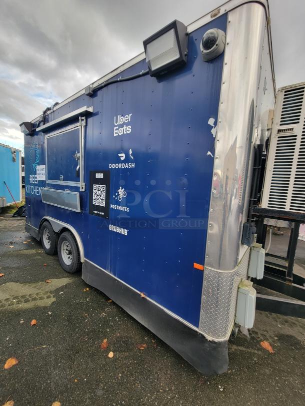 2020 Rock Solid 16' mobile trailer, blue with Uber Eats, DoorDash, Postmates, Grubhub logos, ready for ghost kitchen use.